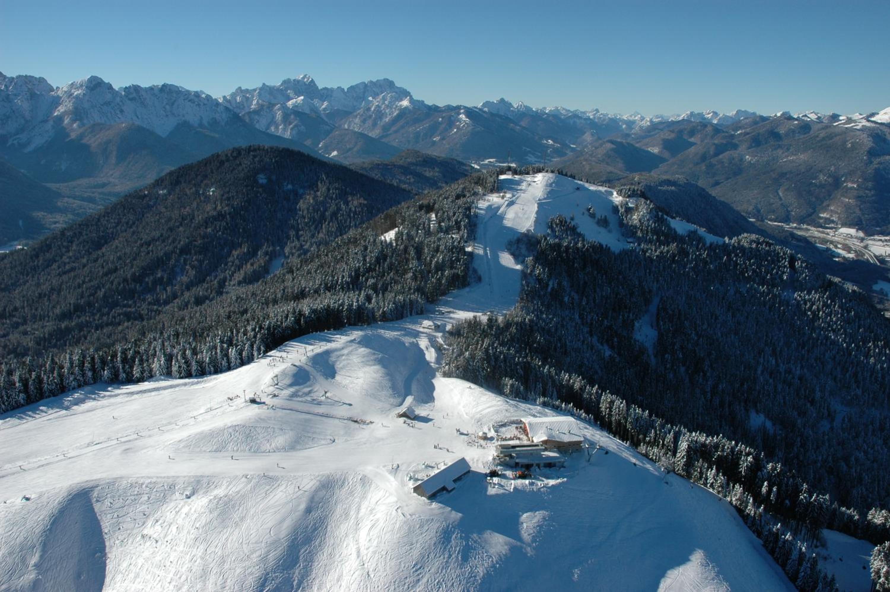 Huis 3landenpunt AT-SLO-IT bij de piste