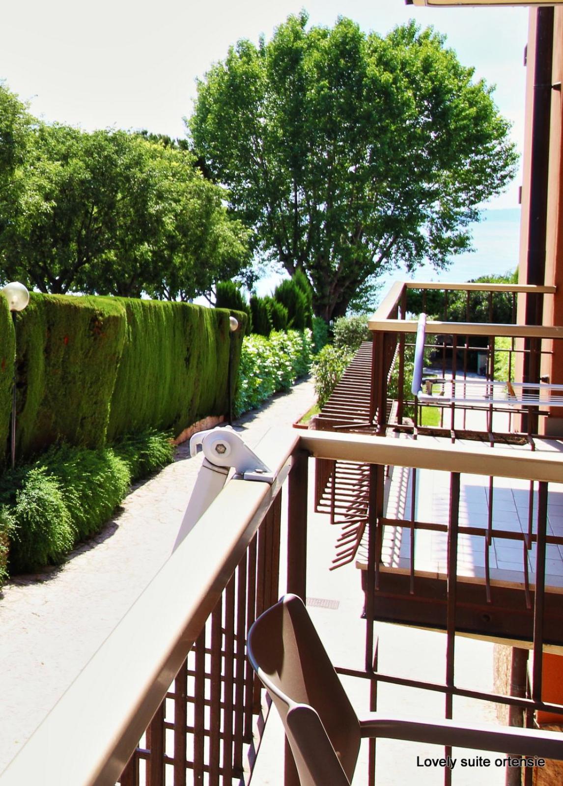 Appartamento con spiaggia privata vista lago nuovissimo view 4
