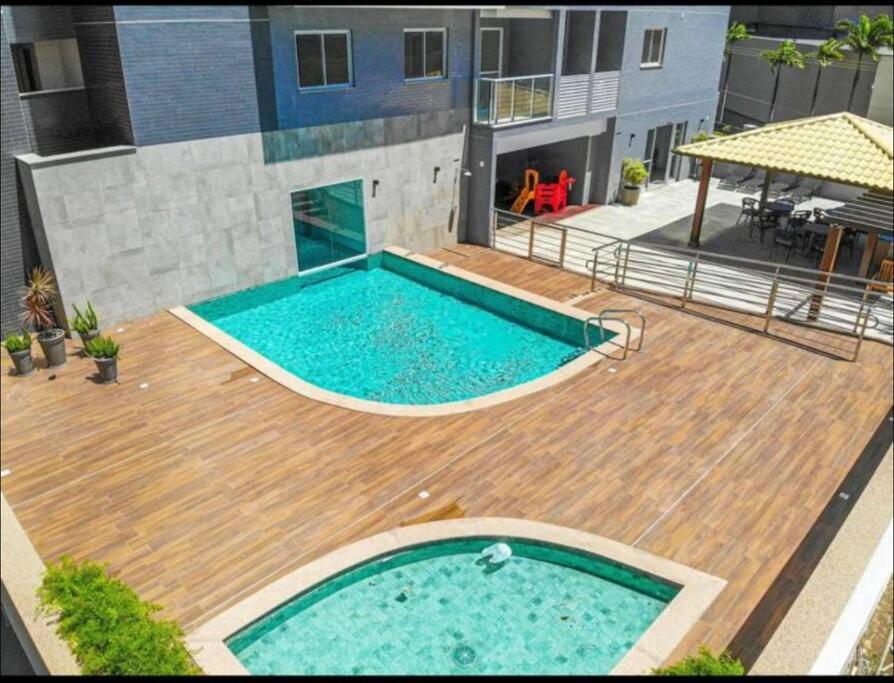 Apartamento em frente ao Shopping e perto da praia