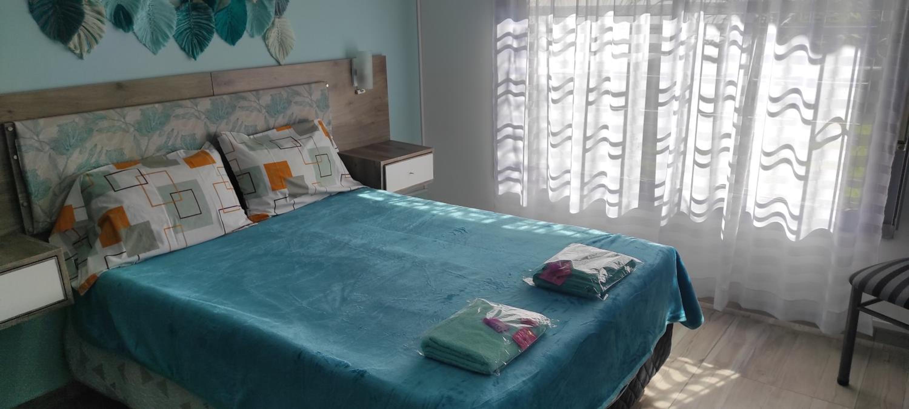 Casa con pileta a 21 minutos de aeropuerto de Ezeiza tranfer opcional las 24 horas amplio parque para mascotas