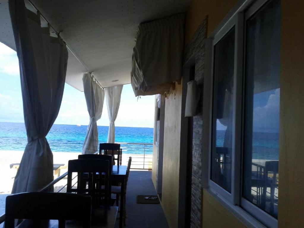 Luzmin BH - Beachfront Cottages view 3