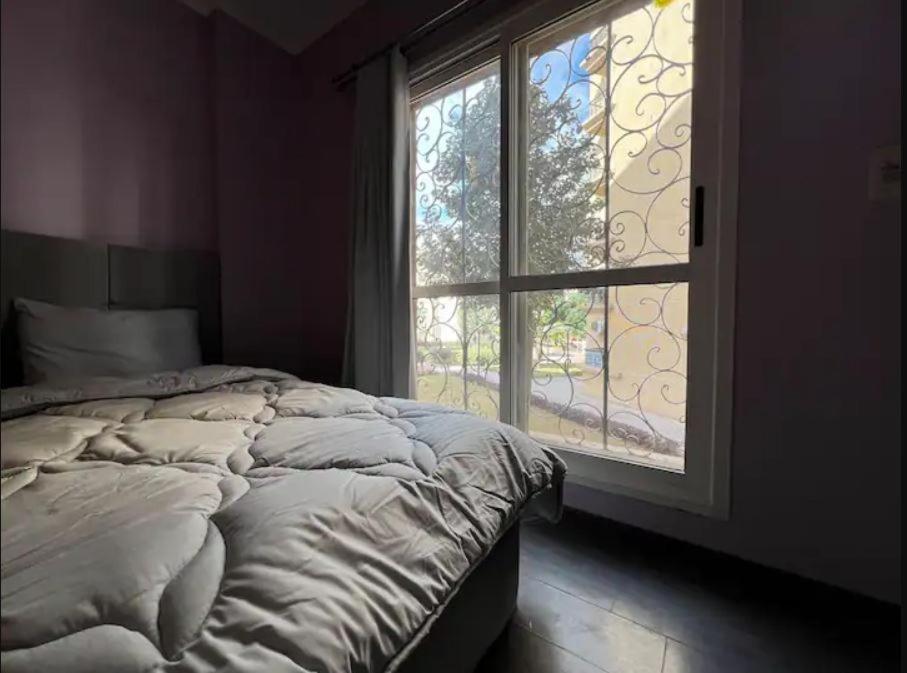2BR Apartment with Private Garden in Downtown Rehab Near Malls