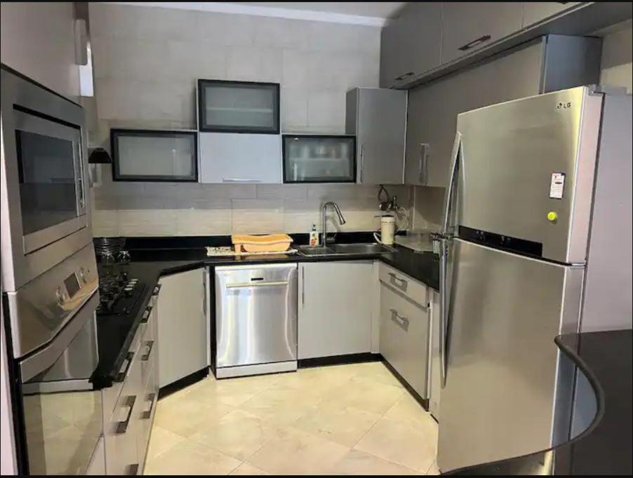 2BR Apartment with Private Garden in Downtown Rehab Near Malls