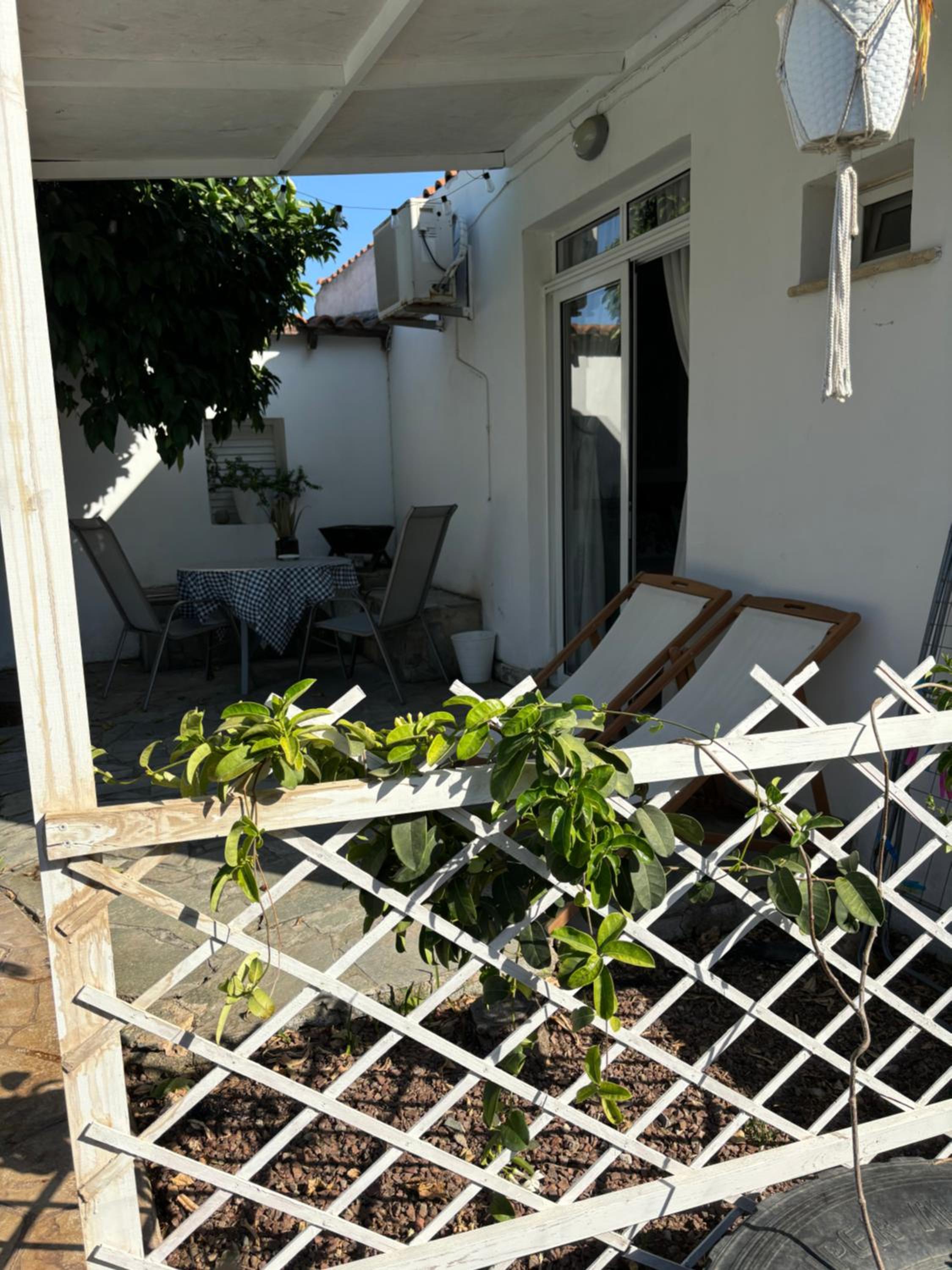 Mediterranean poolside garden cottage