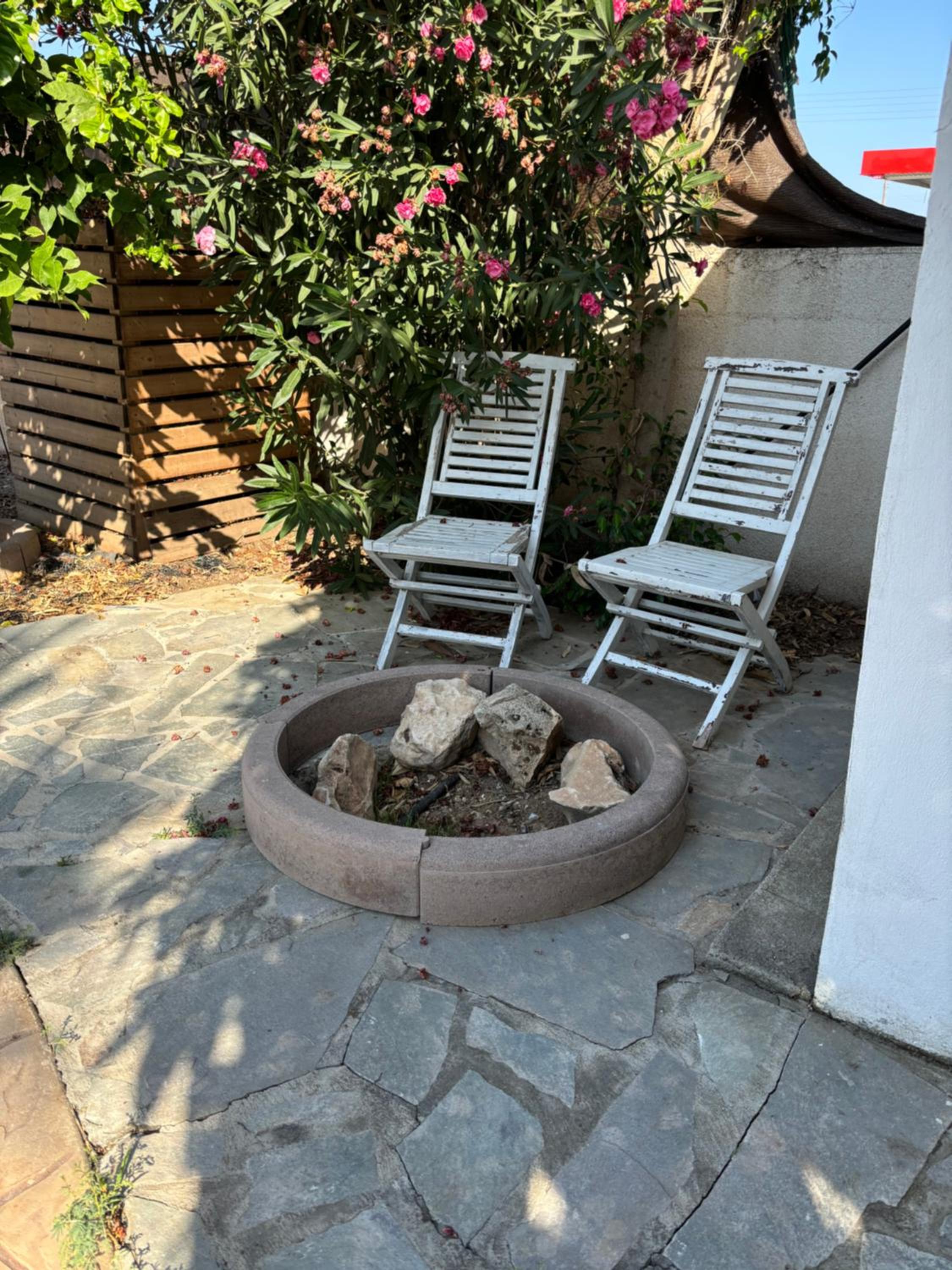 Mediterranean poolside garden cottage