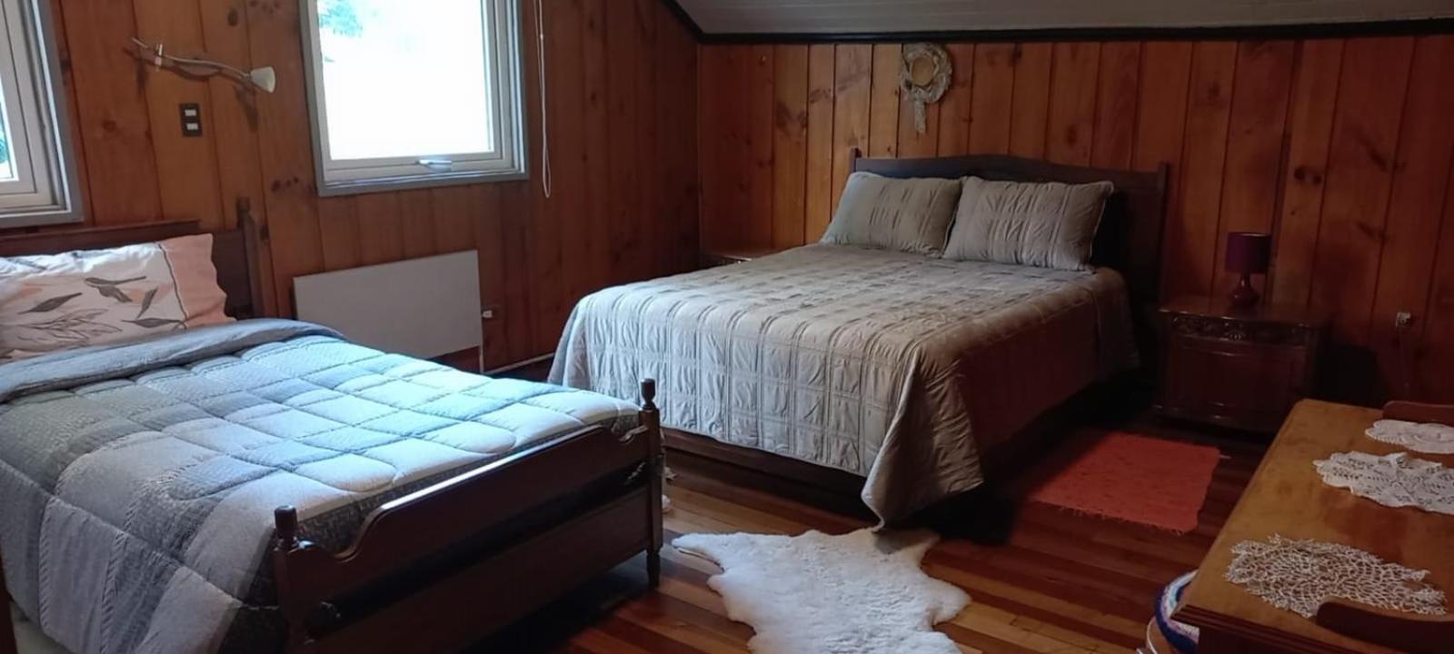 Cabañas y Hostal Casa de Campo Rukaleufu a orillas del Rio Huiscapi