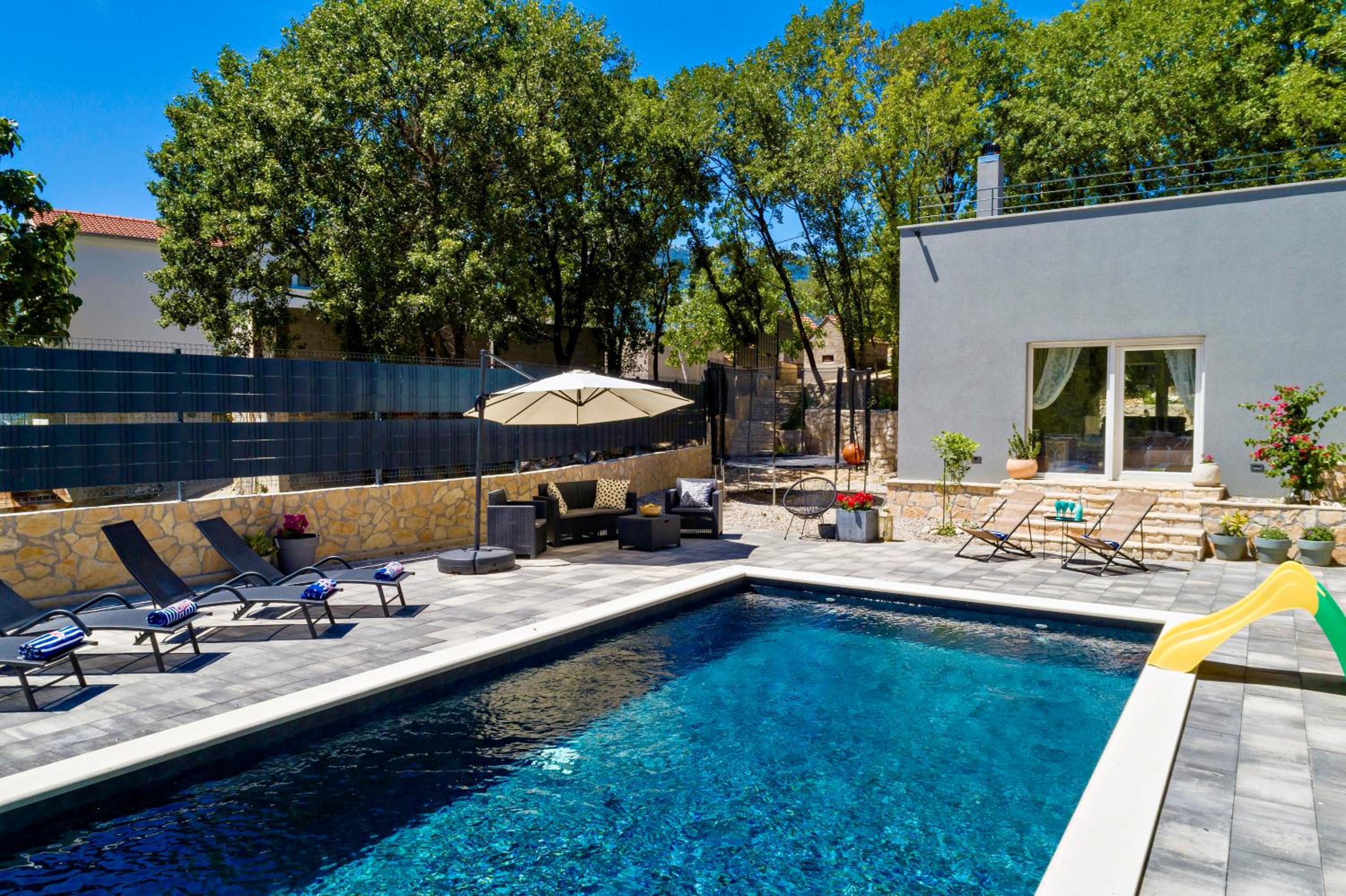 Luxury Villa Andrea Vrzika in forest near the sea with heated pool view 4