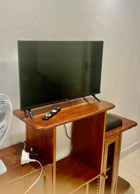 Quarto e sala bem localizado