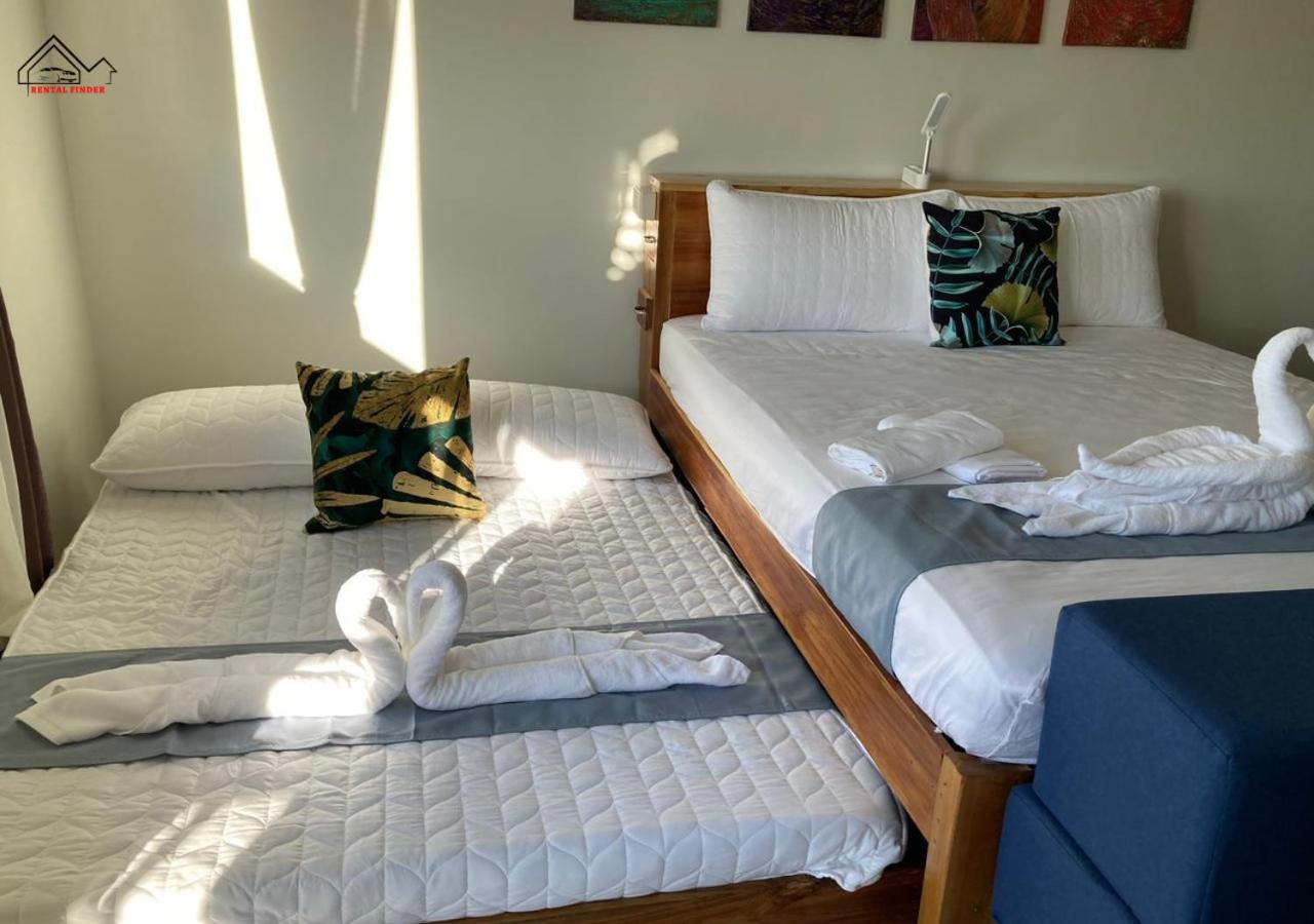 Bancao-Bancao Accommodation with a Balcony, Free Parking, Pool and Gym near Airport - B2 7Opals view 2