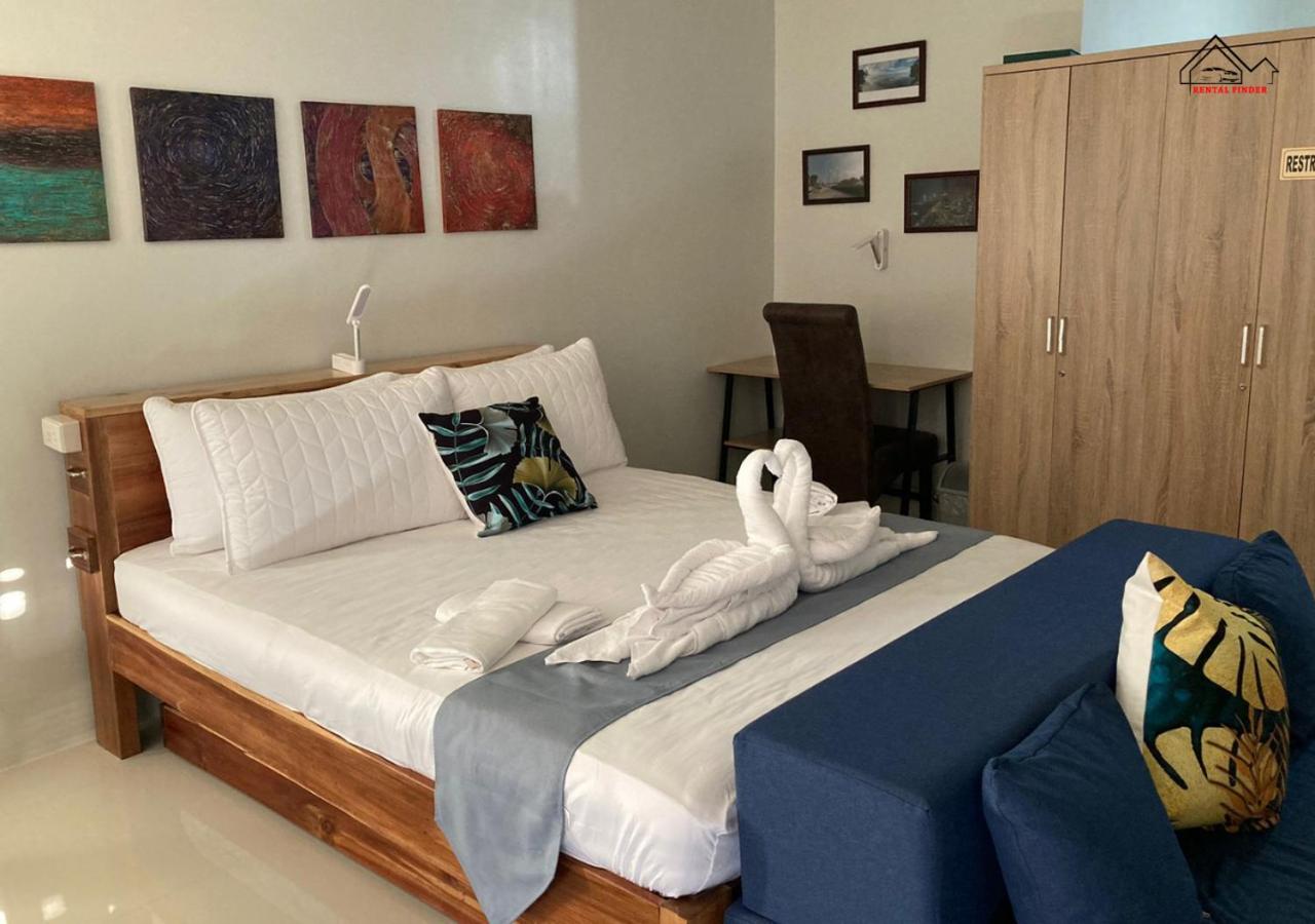 Bancao-Bancao Accommodation with a Balcony, Free Parking, Pool and Gym near Airport - B2 7Opals view 5