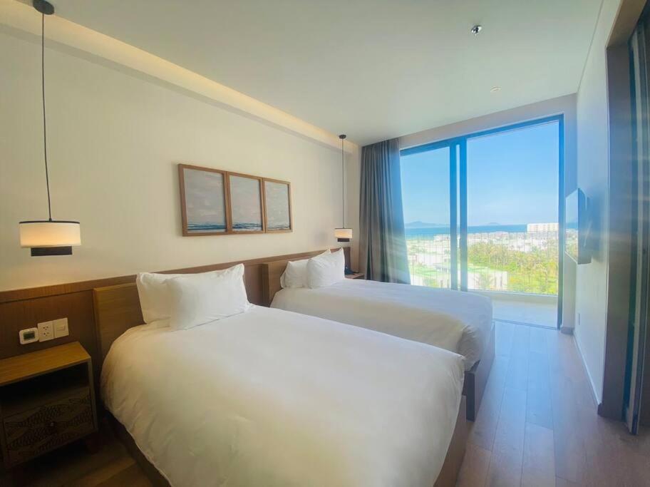 Coastal Vibe - Resort 2BR apartment Pool & Beach view 5