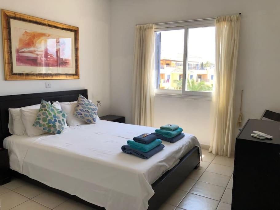 Limnaria Gardens - spacious and sunny 1 bed with pool views