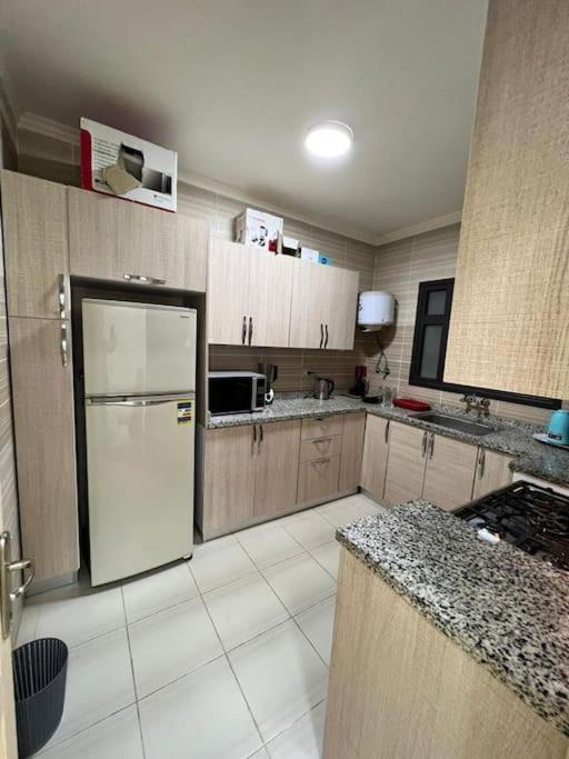 Peaceful 3-BR Hotel Apt Madinaty view 4