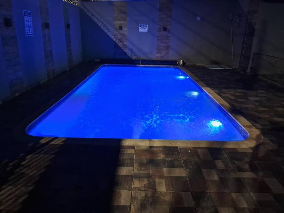 Casa grande com piscina Chácara do Dinho