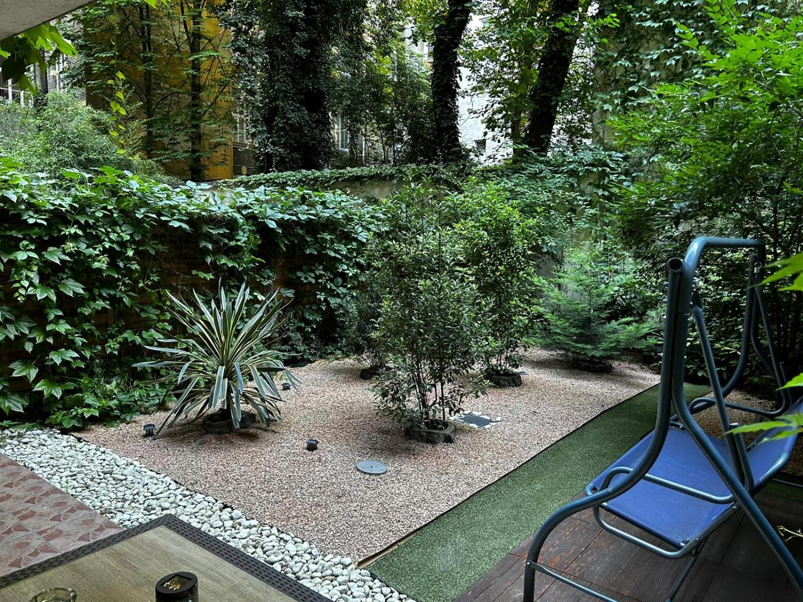 Exclusive Central Apartment with Private Garden