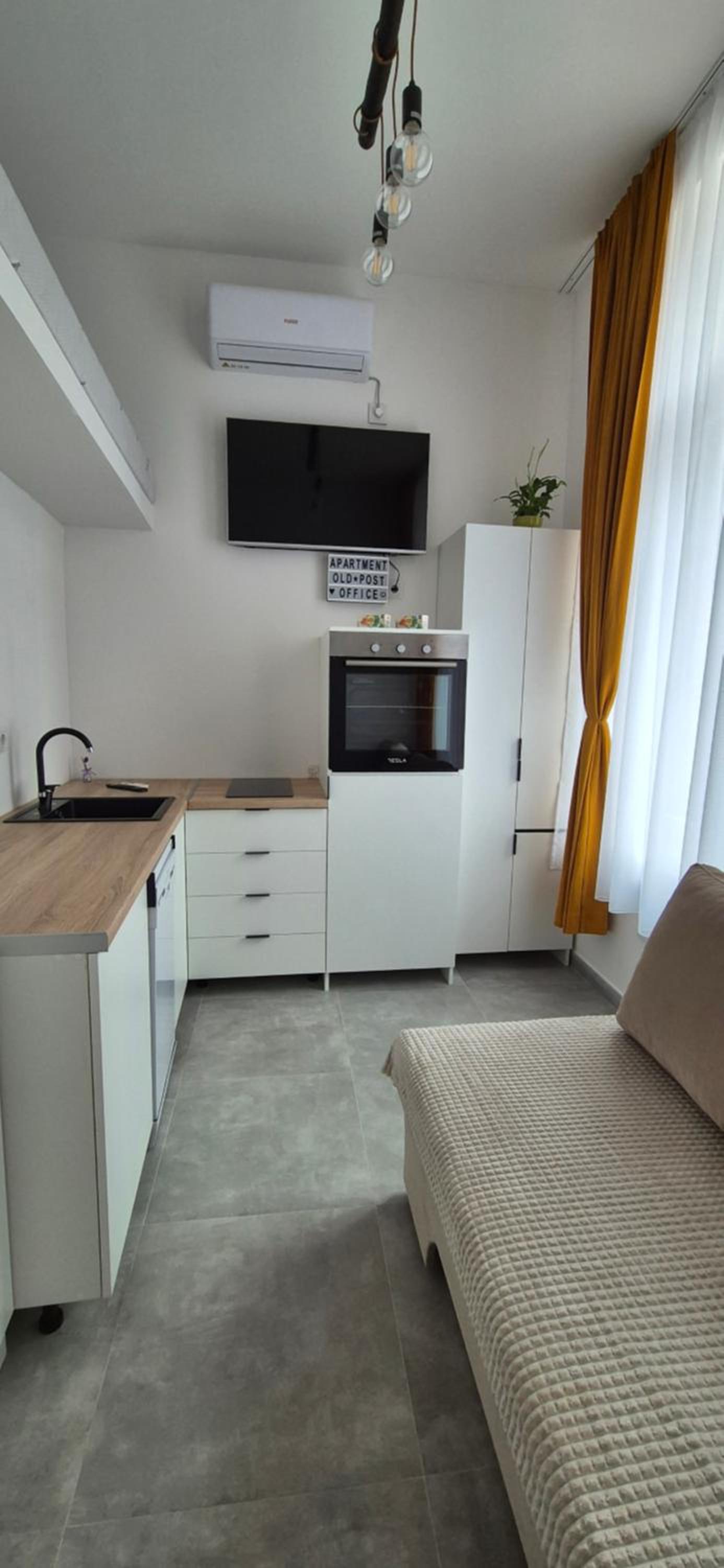 Studio apartment Postcard with free parking