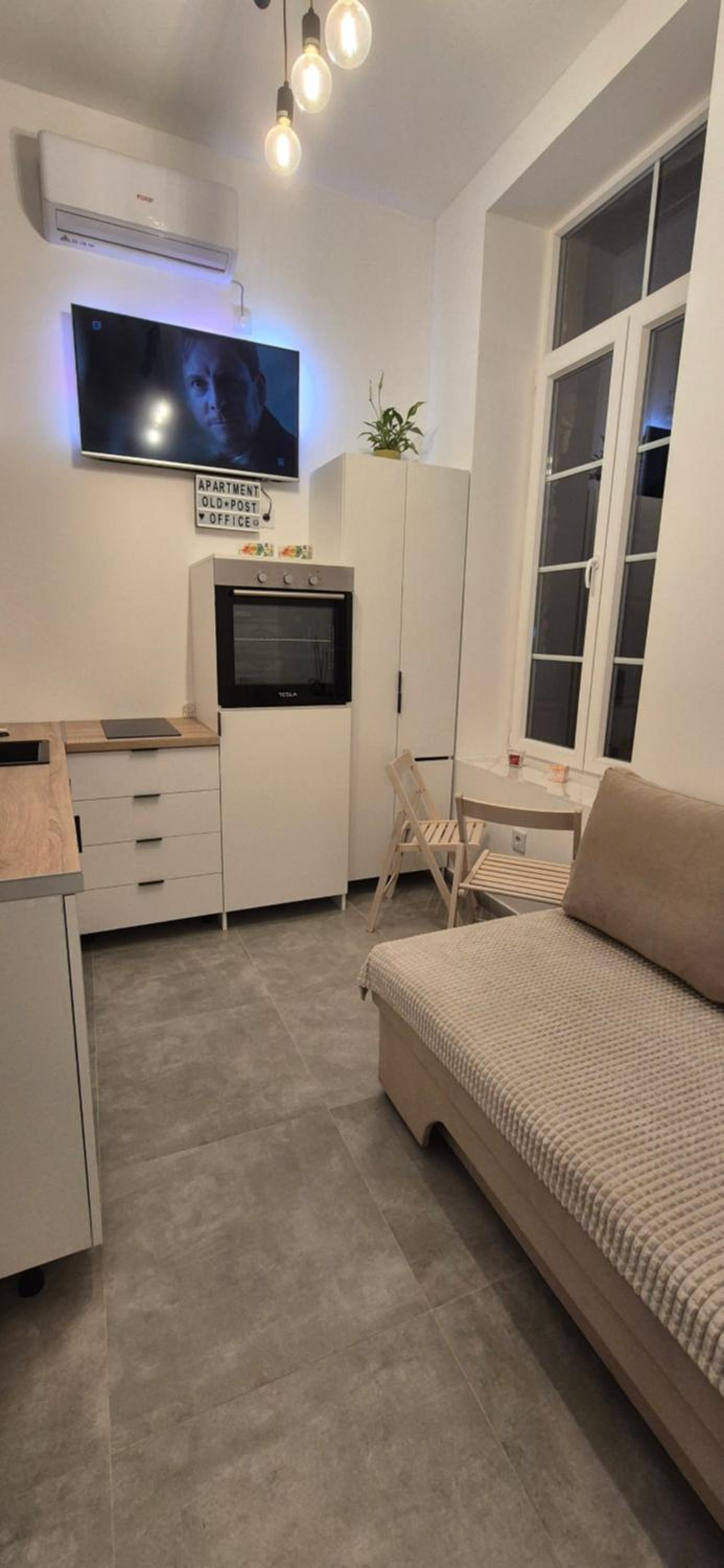 Studio apartment Postcard with free parking