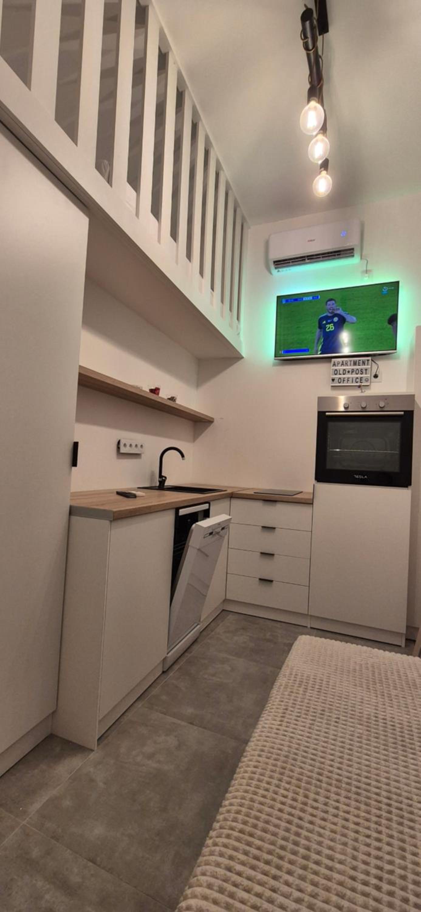 Studio apartment Postcard with free parking