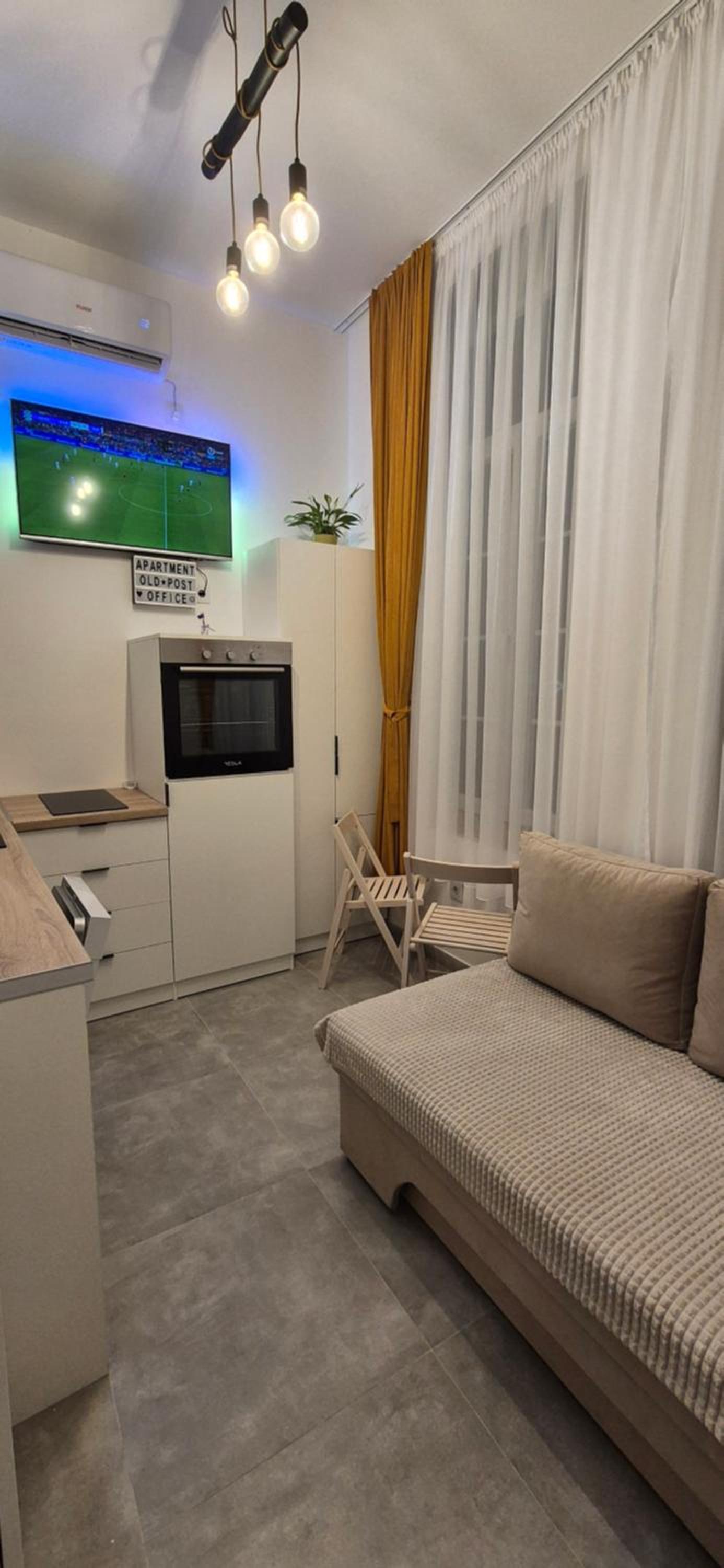 Studio apartment Postcard with free parking