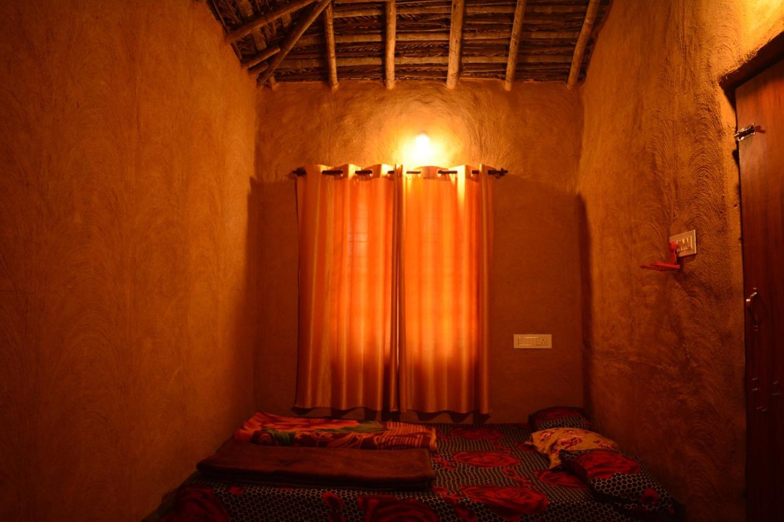 Cosmic Mud House Kanthalloor