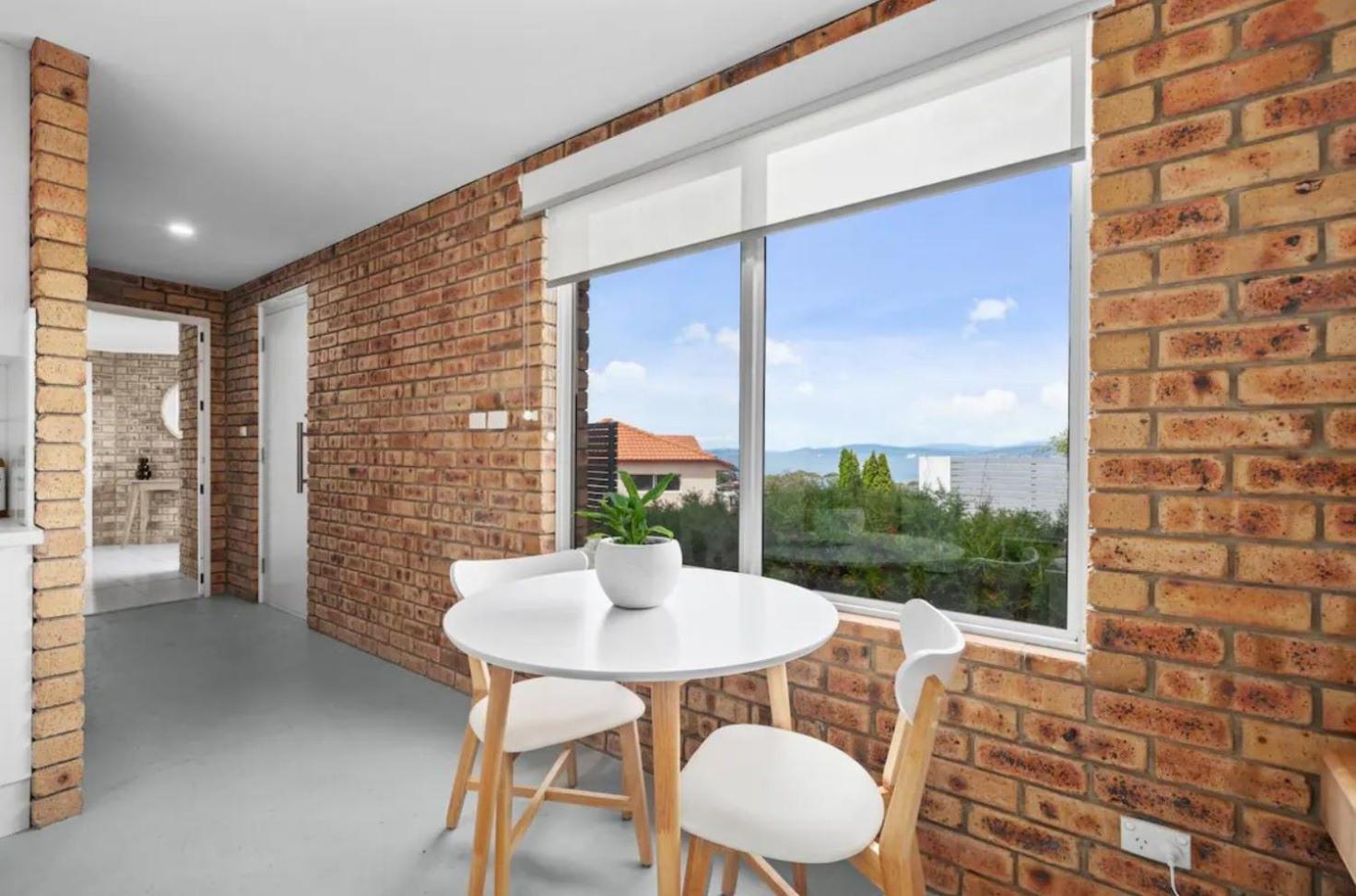 House on the Hillside with City Views Sleeps 12