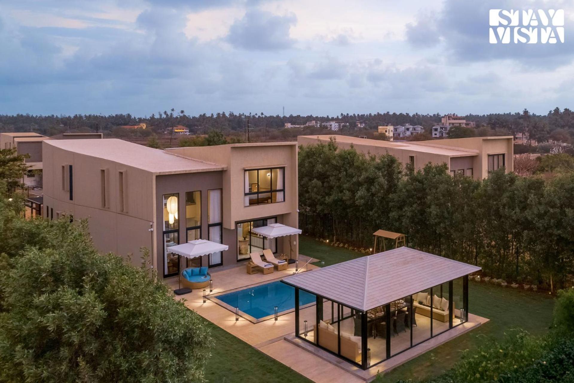 Sunlit Splendour by StayVista near Nagaon beach boasting an Outdoor pool and Modern chic interiors view 2