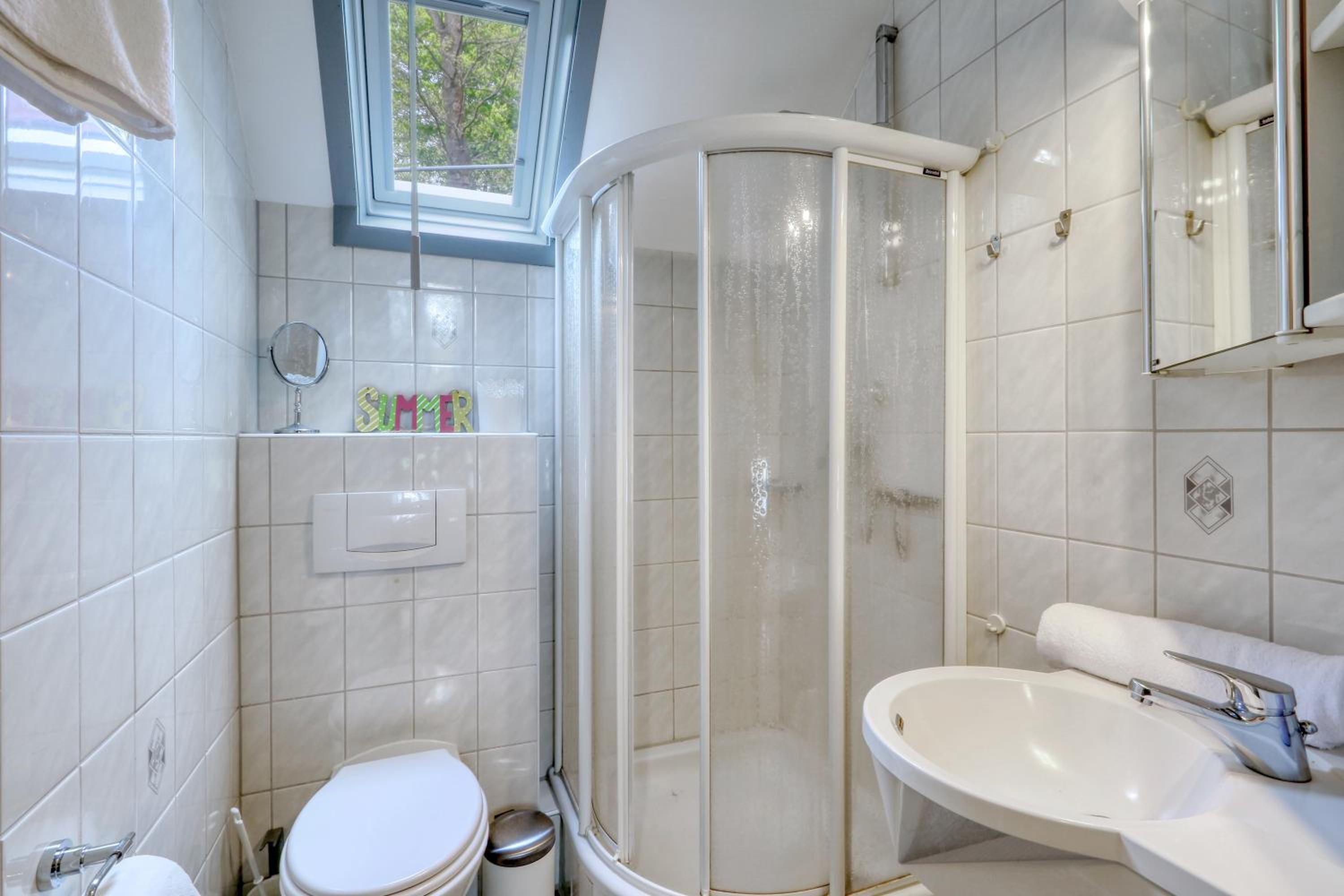 Ferienhaus 21 mit Seeblick und Garten bis 6 Personen