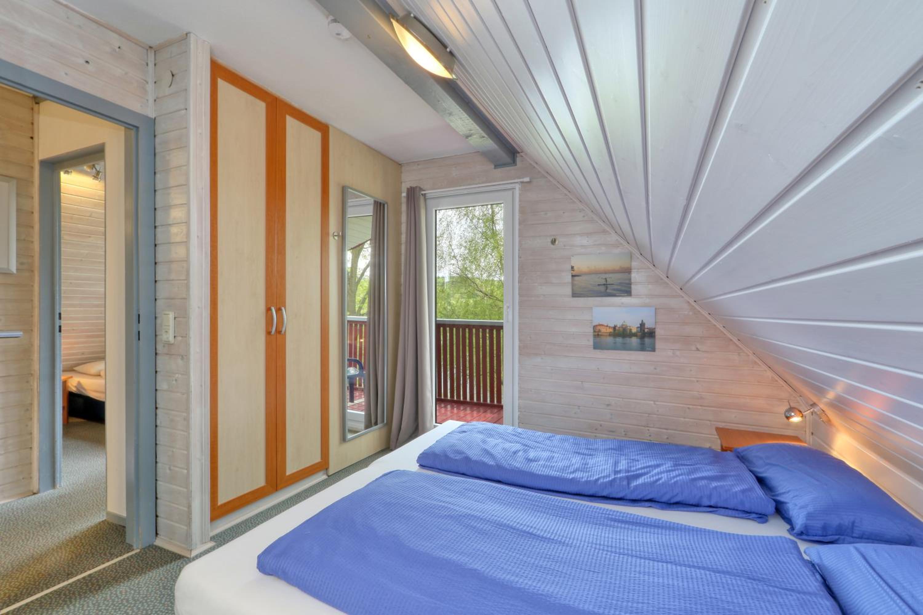 Ferienhaus 21 mit Seeblick und Garten bis 6 Personen