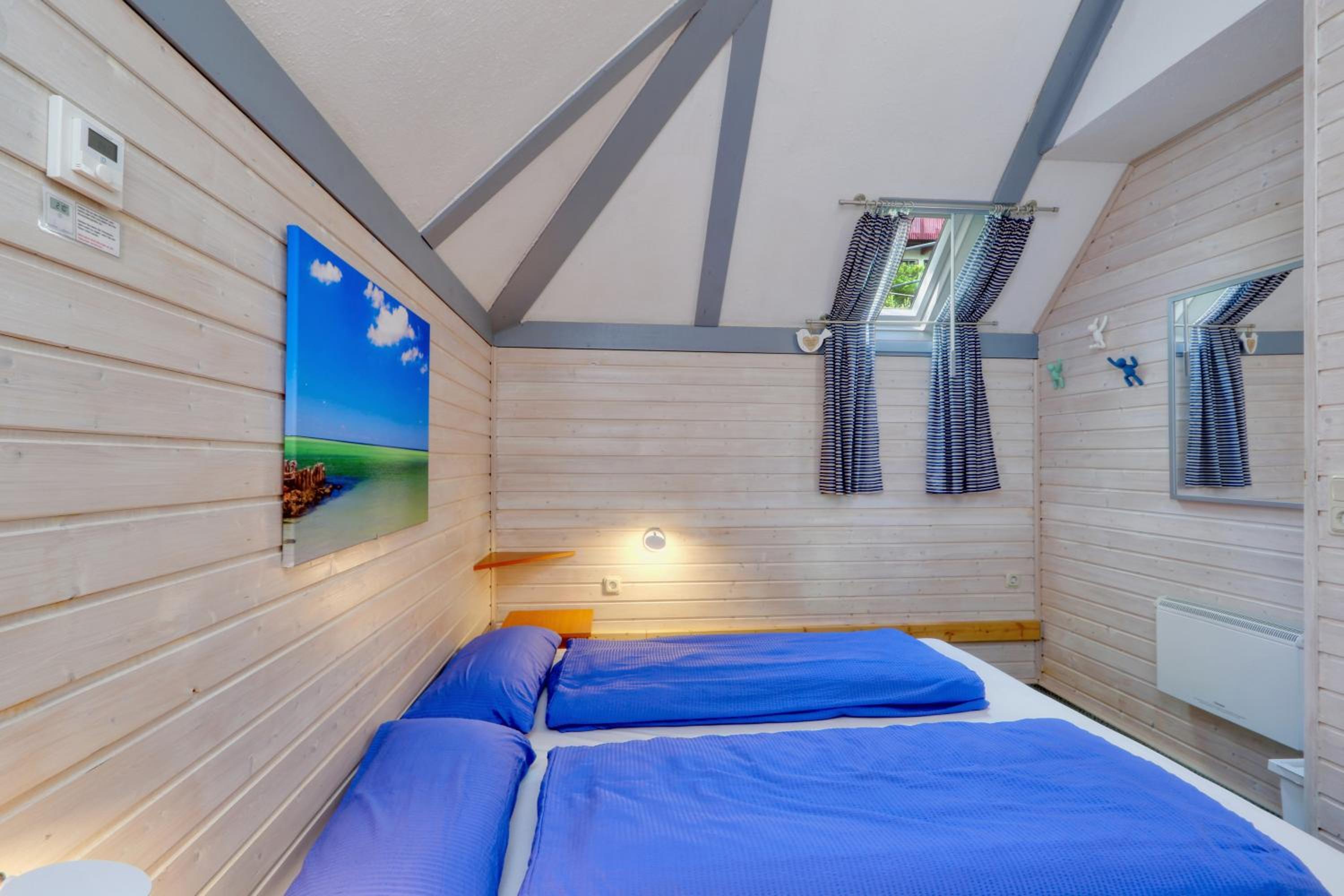 Ferienhaus 21 mit Seeblick und Garten bis 6 Personen