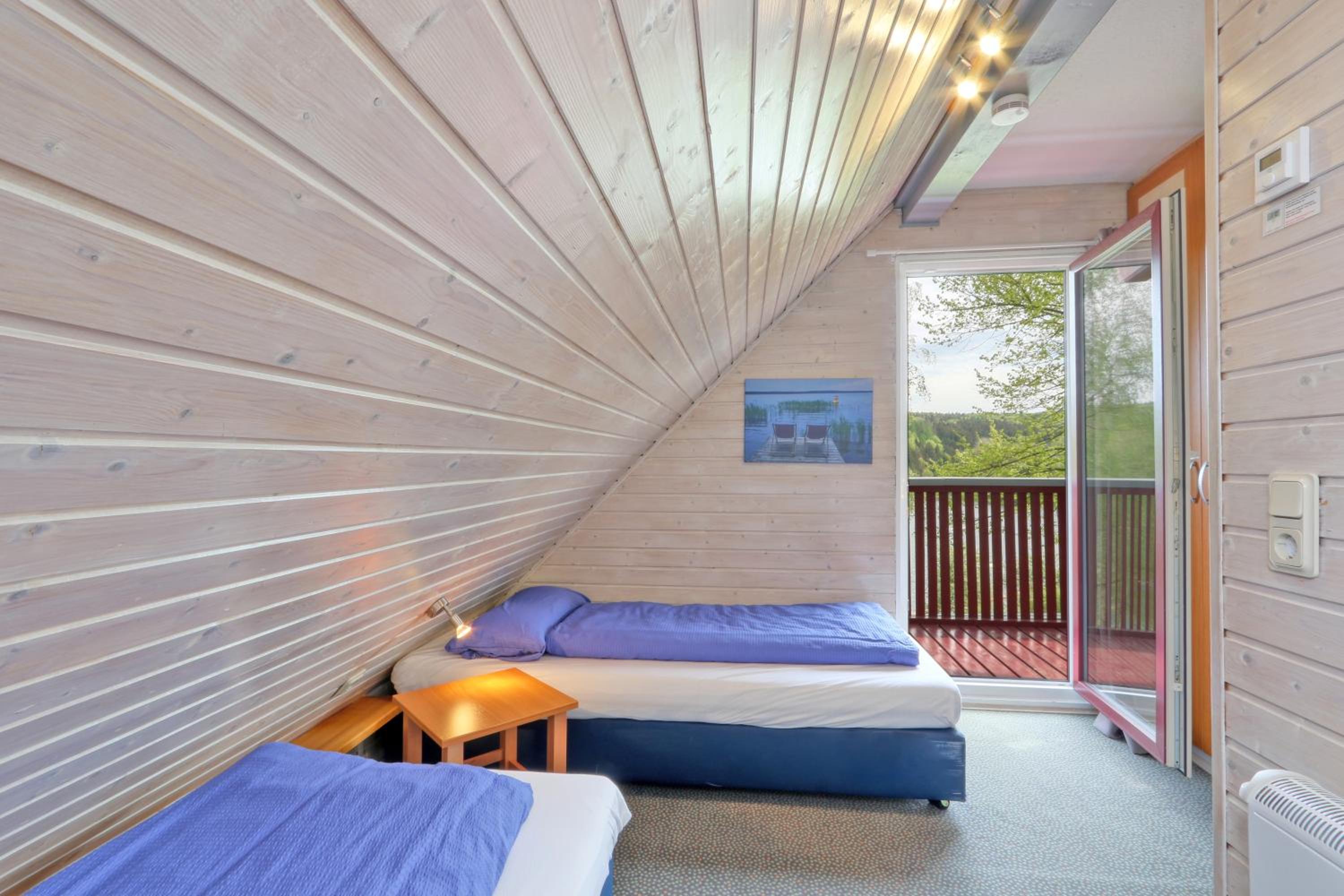 Ferienhaus 21 mit Seeblick und Garten bis 6 Personen