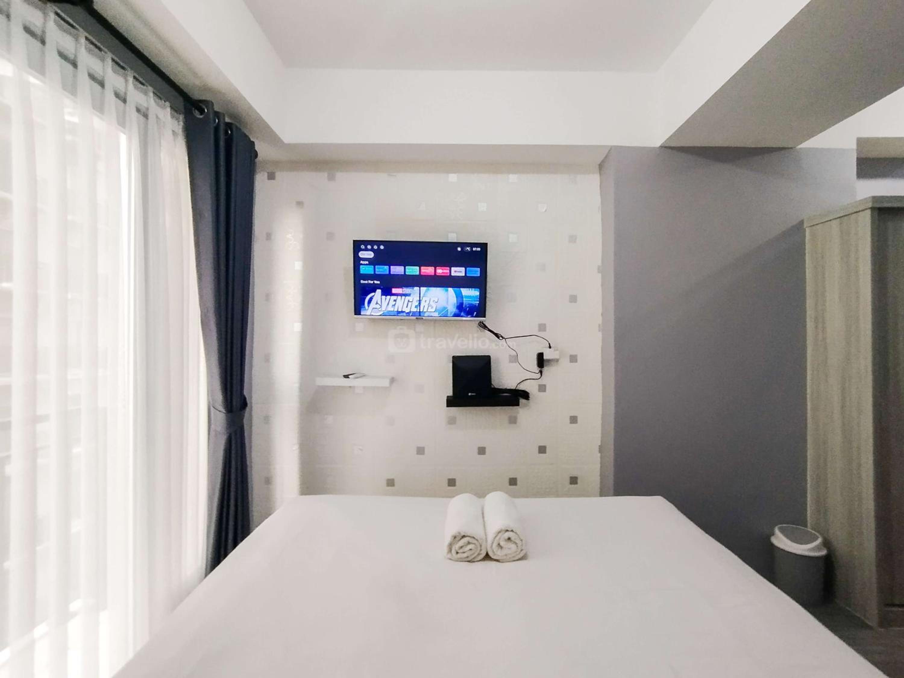 Homey Grey Studio Apartment at Grand Asia Afrika Bandung By Travelio view 3