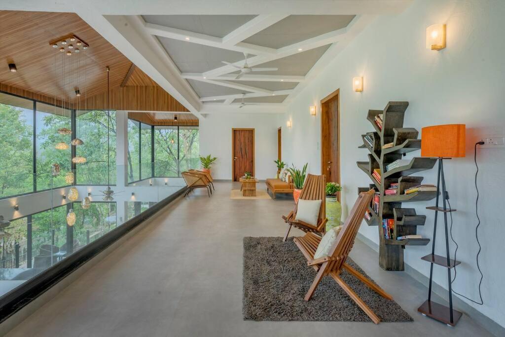 SaffronStays Sonnet - 4BR veg pool villa with grand piano, theater, lawn & mountain views near Mumbai