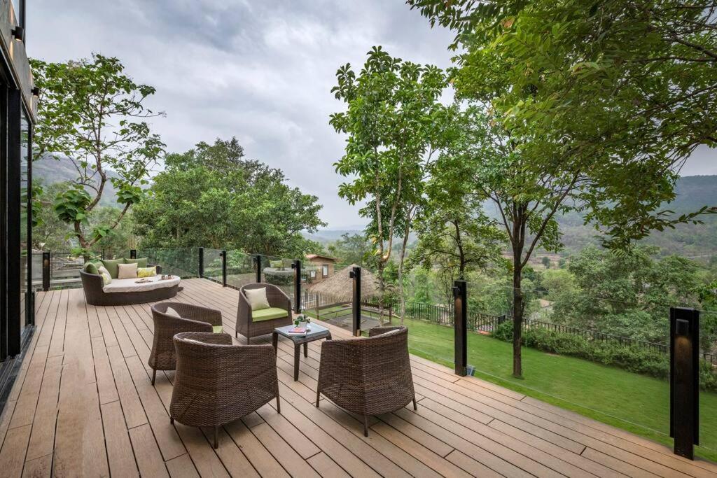 SaffronStays Sonnet - 4BR veg pool villa with grand piano, theater, lawn & mountain views near Mumbai