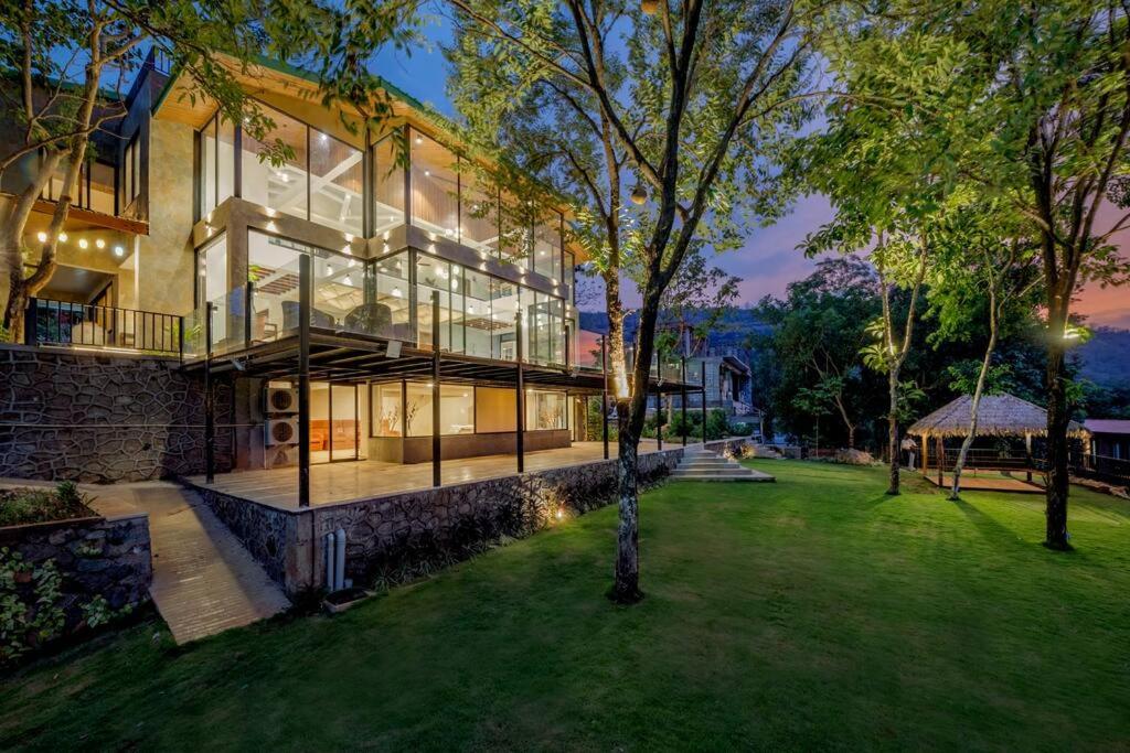 SaffronStays Sonnet - 4BR veg pool villa with grand piano, theater, lawn & mountain views near Mumbai