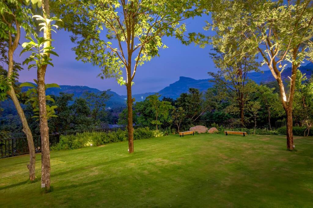 SaffronStays Sonnet - 4BR veg pool villa with grand piano, theater, lawn & mountain views near Mumbai