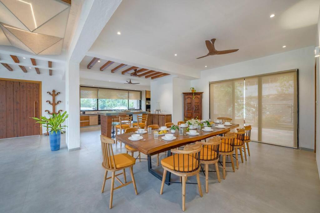 SaffronStays Sonnet - 4BR veg pool villa with grand piano, theater, lawn & mountain views near Mumbai