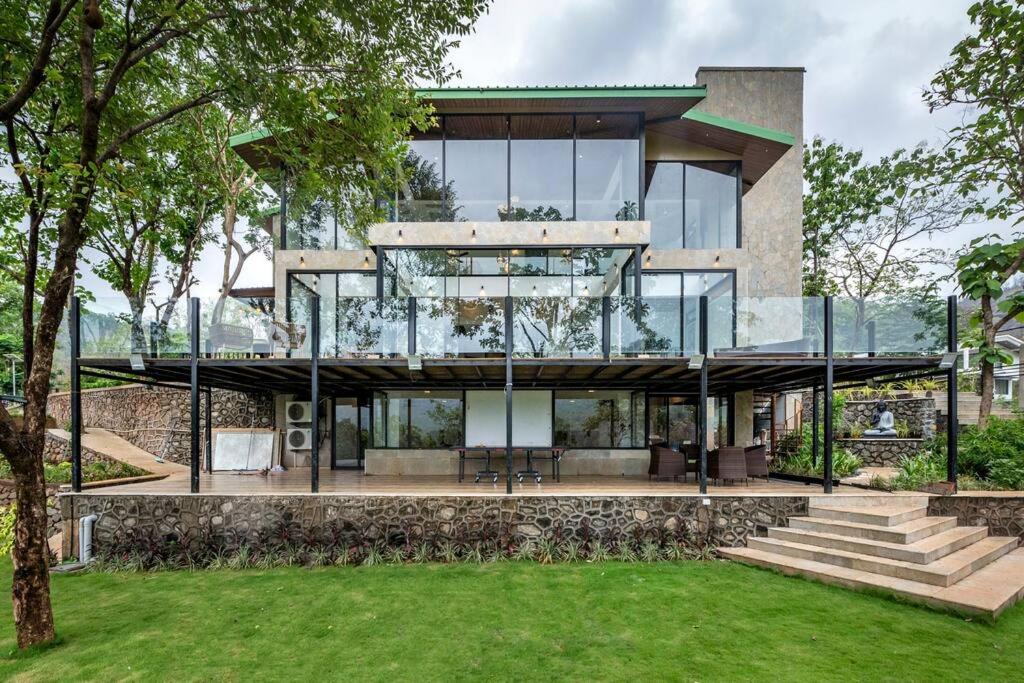 SaffronStays Sonnet - 4BR veg pool villa with grand piano, theater, lawn & mountain views near Mumbai