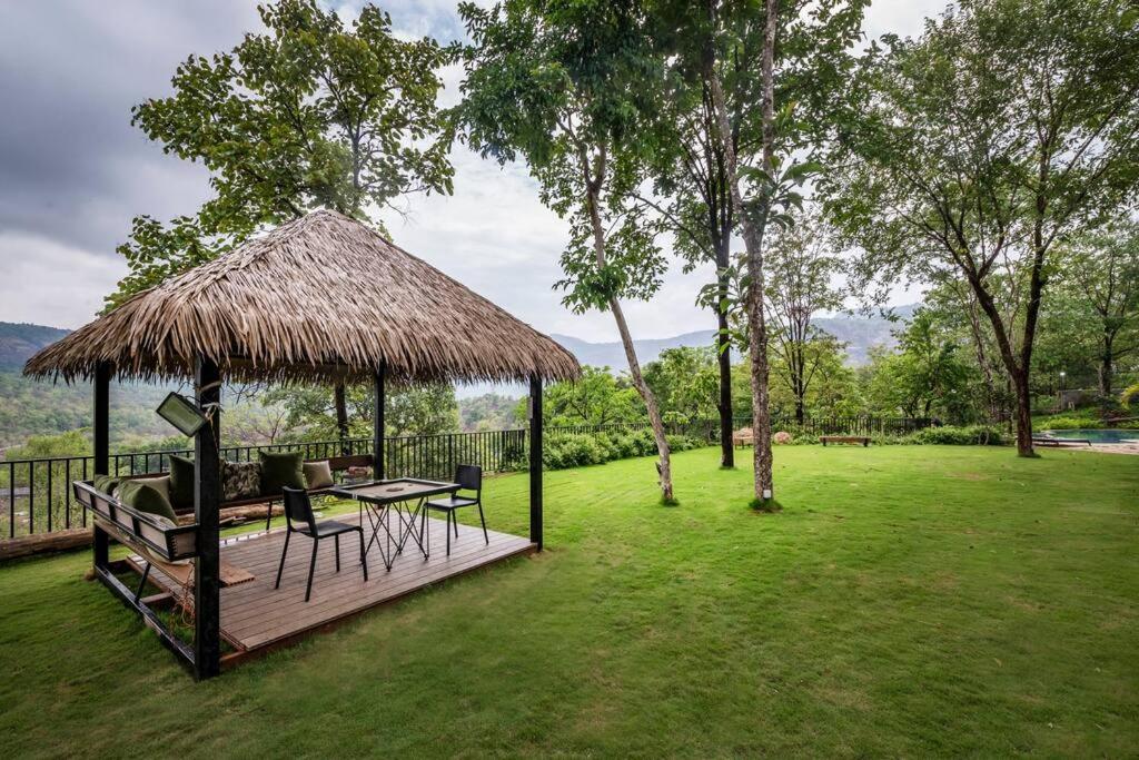 SaffronStays Sonnet - 4BR veg pool villa with grand piano, theater, lawn & mountain views near Mumbai