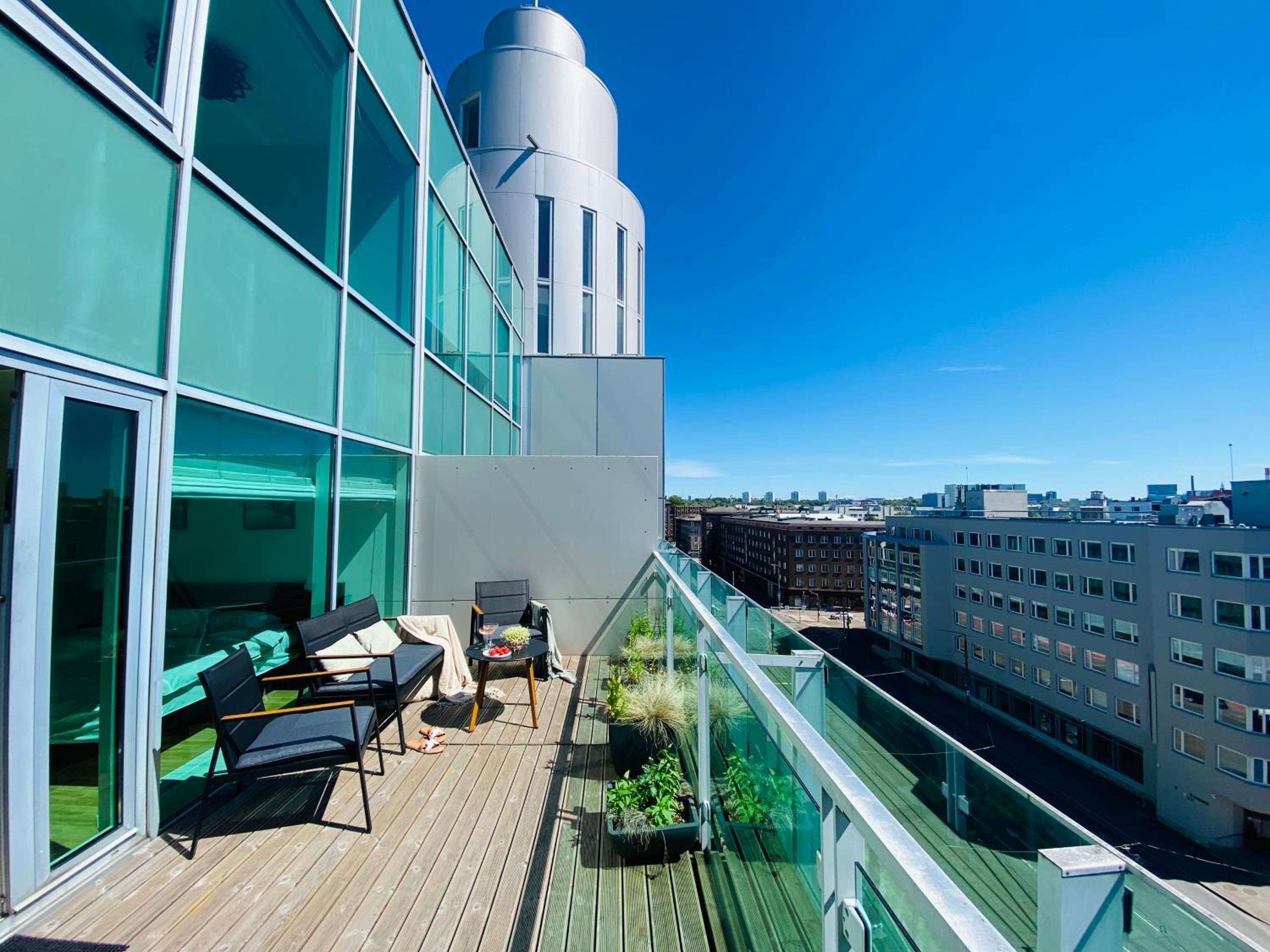 City Heart Apartment with a Sunny Rooftop Terrace