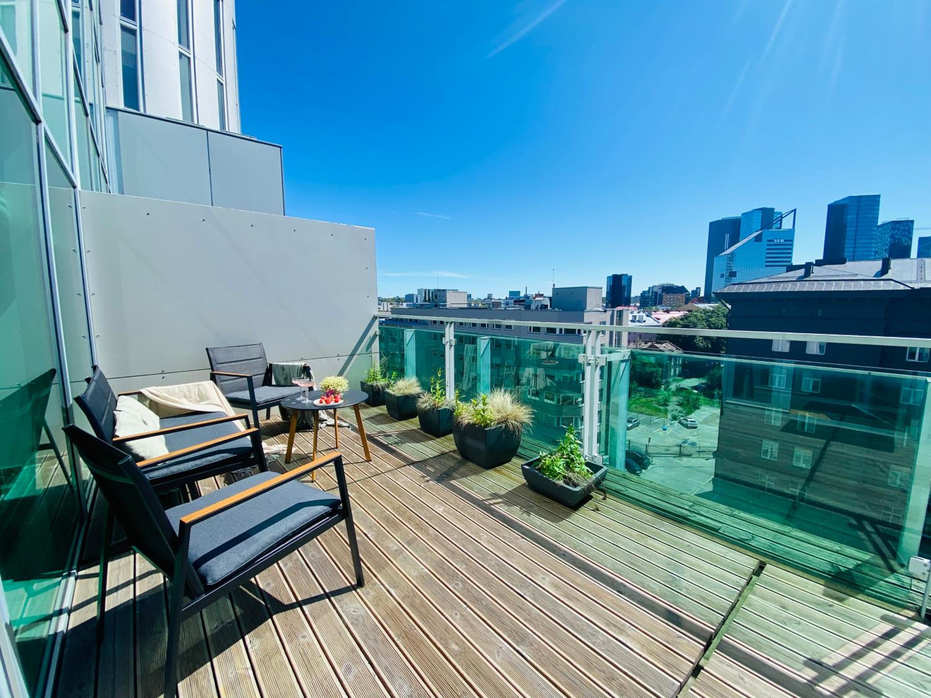 City Heart Apartment with a Sunny Rooftop Terrace