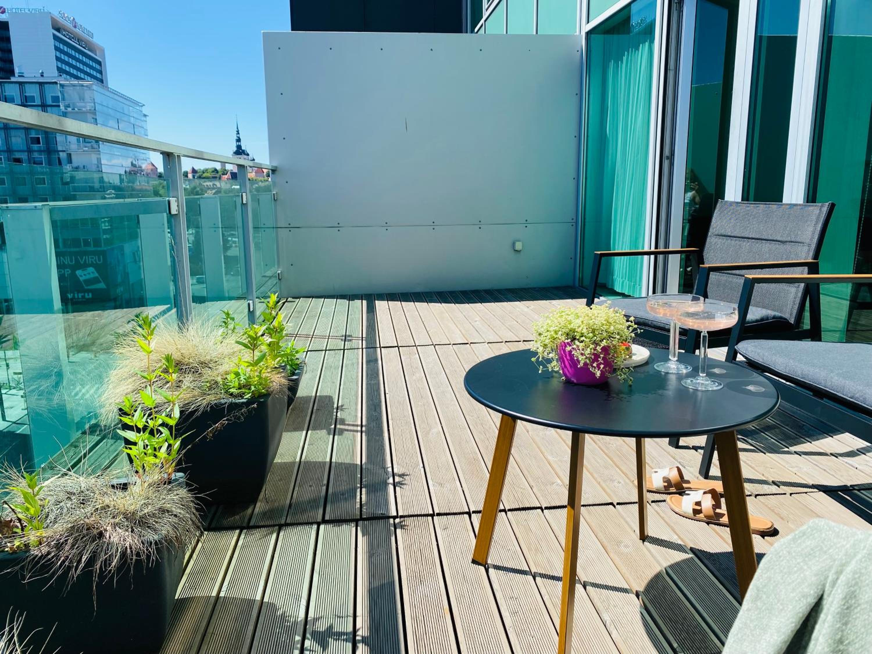 City Heart Apartment with a Sunny Rooftop Terrace