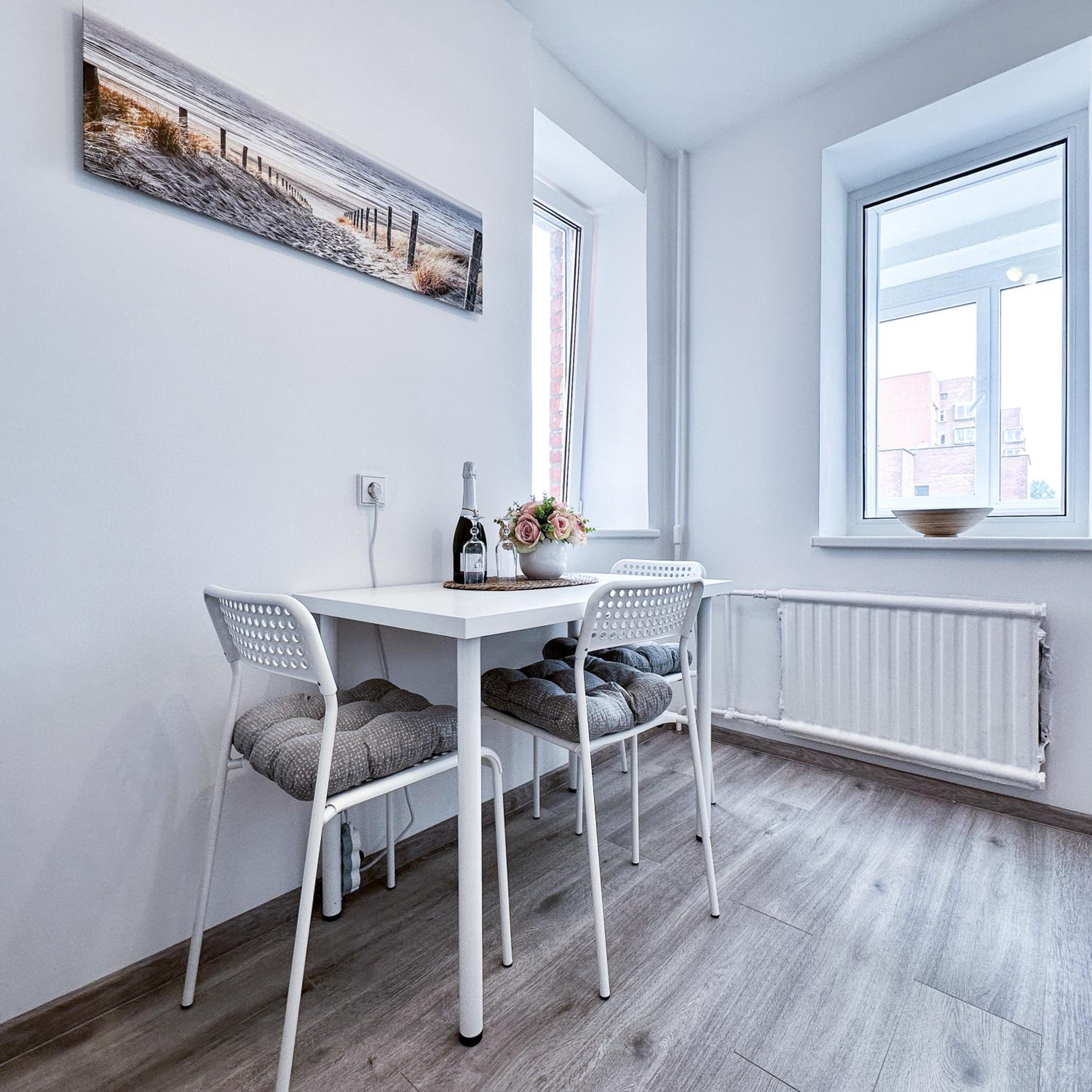 A cozy apartment next to a port view 4