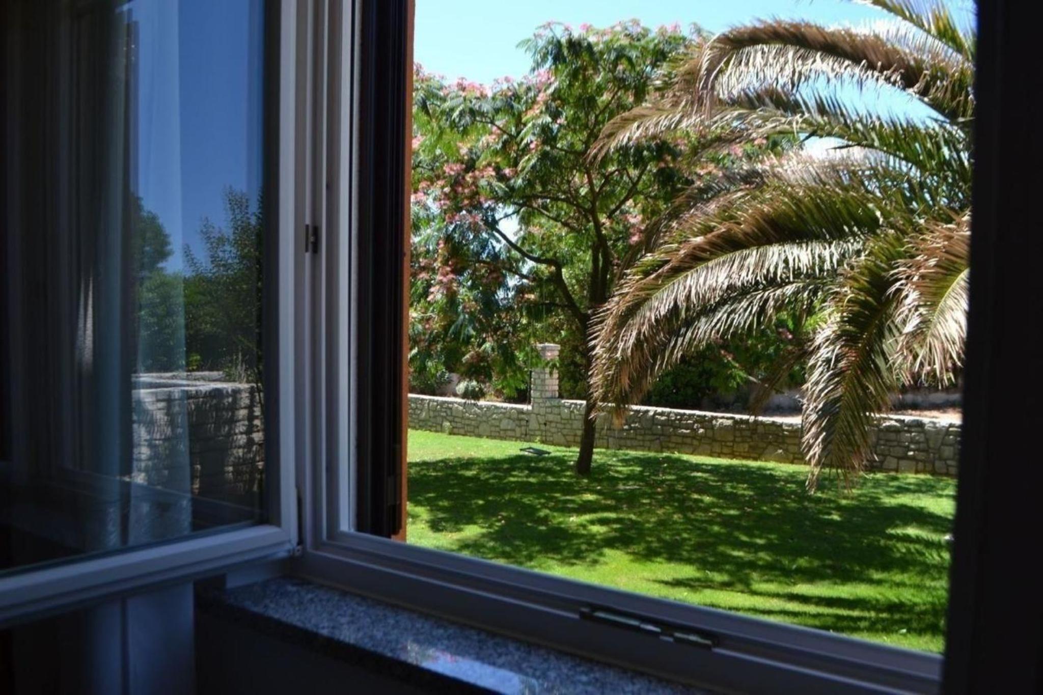 Klimatisierte Wohnung in Zambratija mit Gepflegtem Garten