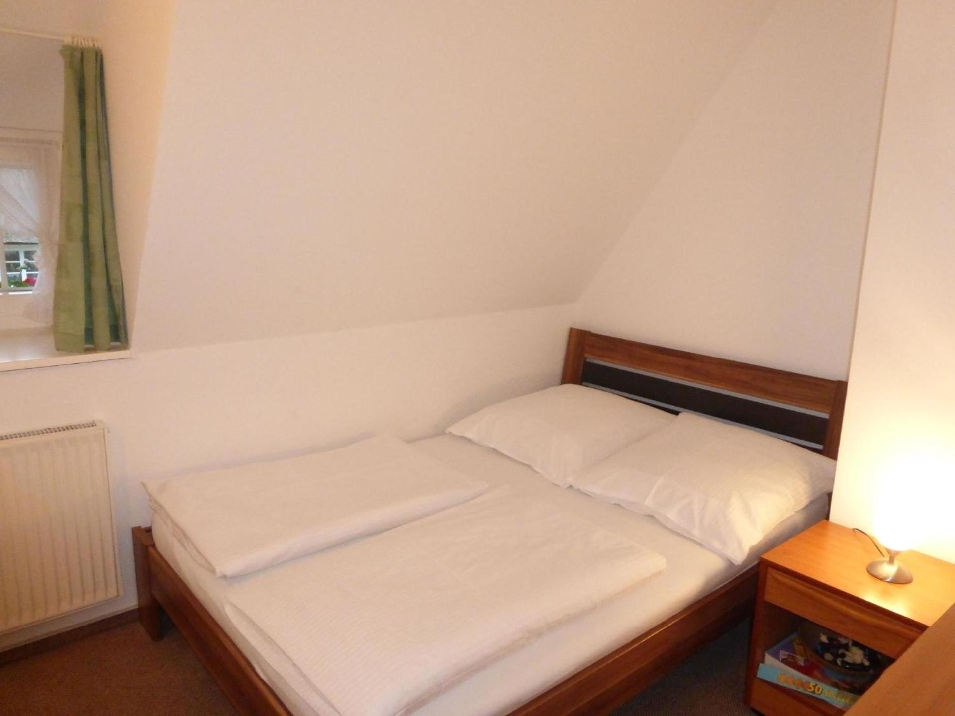 Ferienwohnung mit Terrasse im Obergeschoss