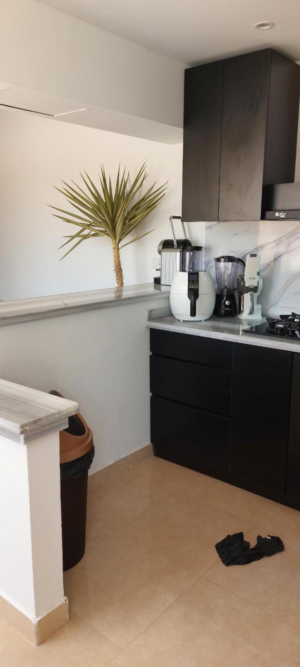 Luxe flat met privé strand en zwembaden