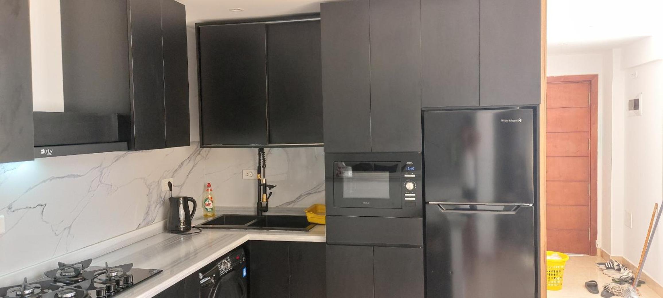 Luxe flat met privé strand en zwembaden