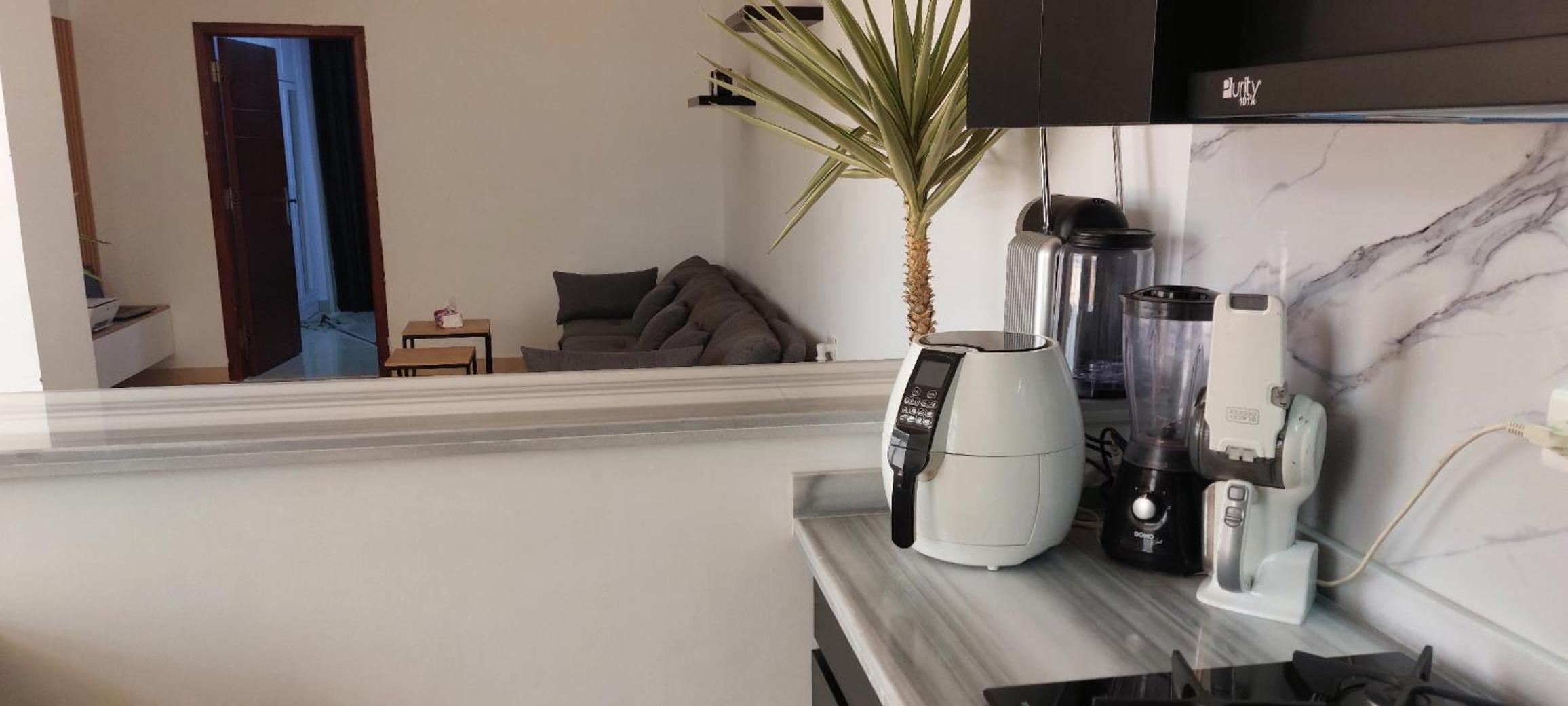 Luxe flat met privé strand en zwembaden