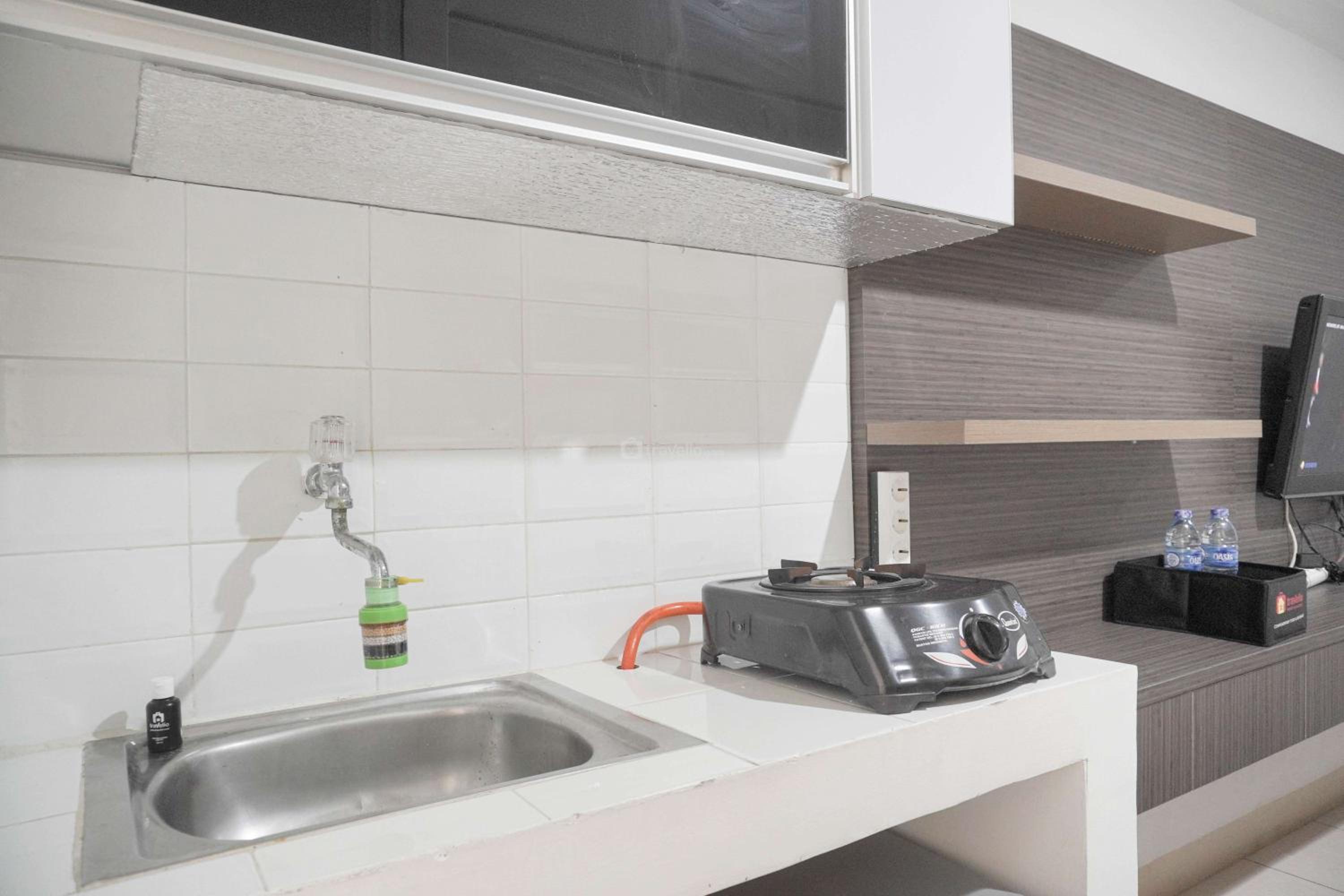 Cozy Living Studio at Green Bay Pluit Apartment By Travelio