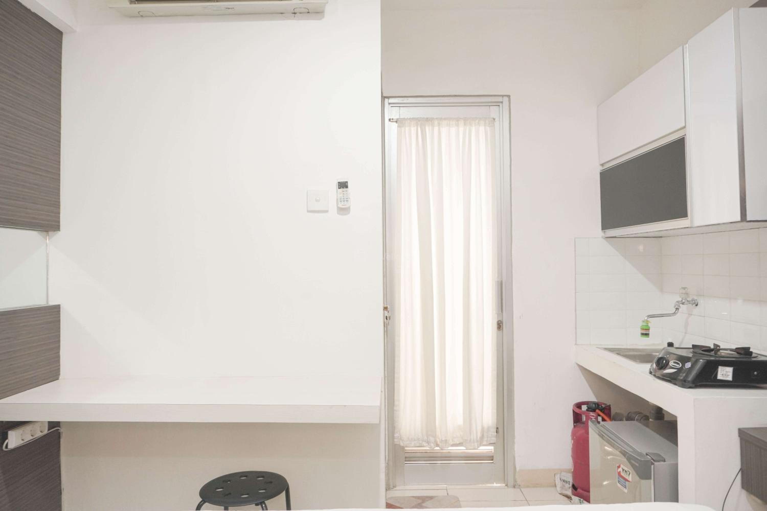 Cozy Living Studio at Green Bay Pluit Apartment By Travelio