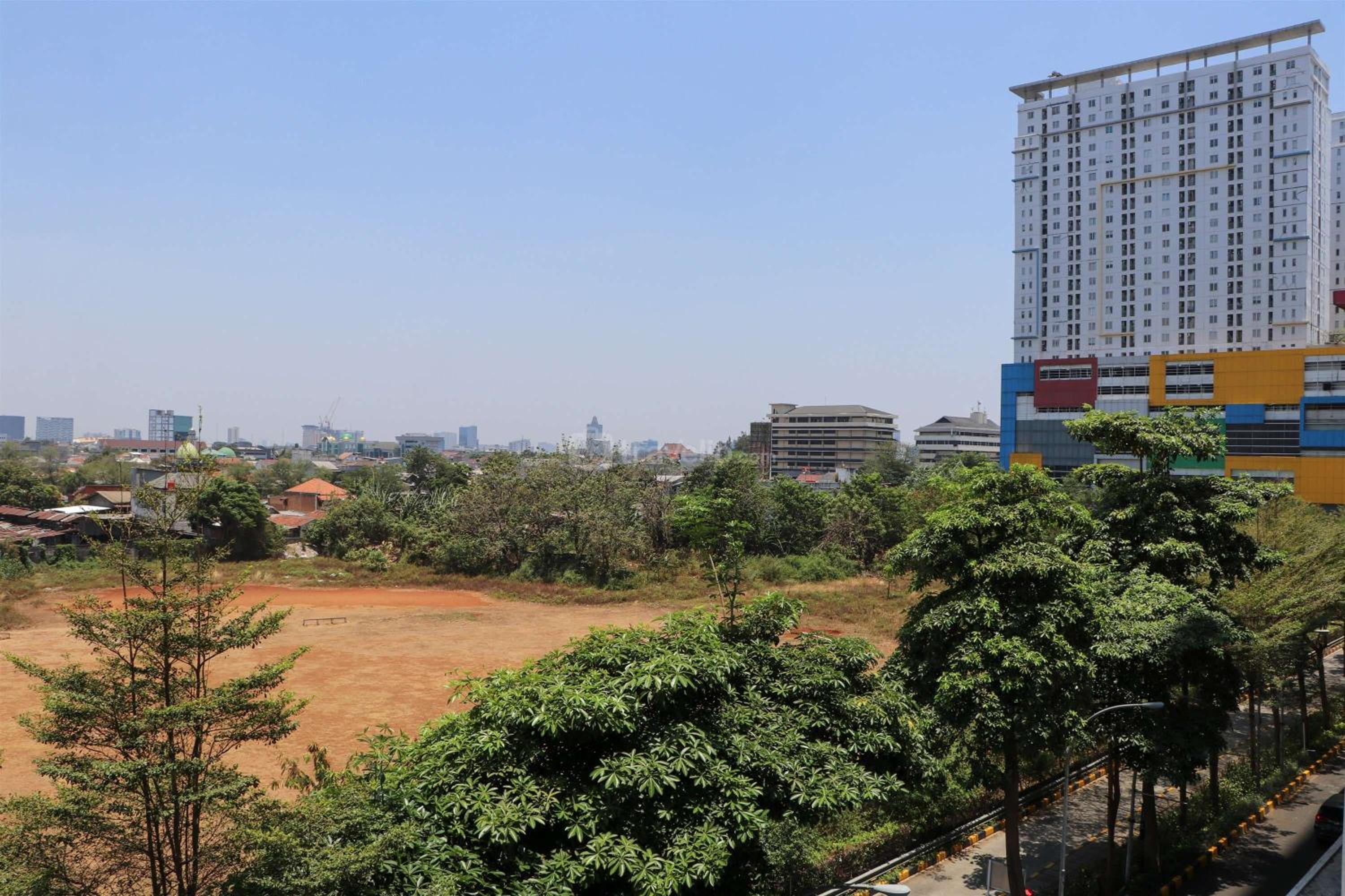 Minimalist and Warm 1BR at Bassura City Apartment By Travelio